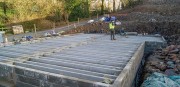 Block and beam floor being built